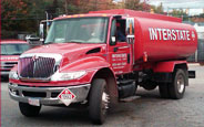 red interstate gas and oil truck