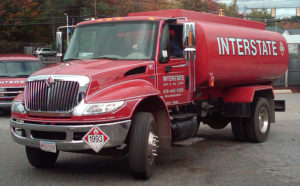 red interstate gas and oil truck